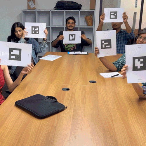 Six people hold up QR codes in different orientations, while a man scans these codes from left to right to record them